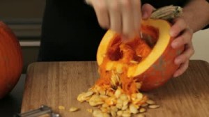 scooping-out-seeds-of-pumpkin