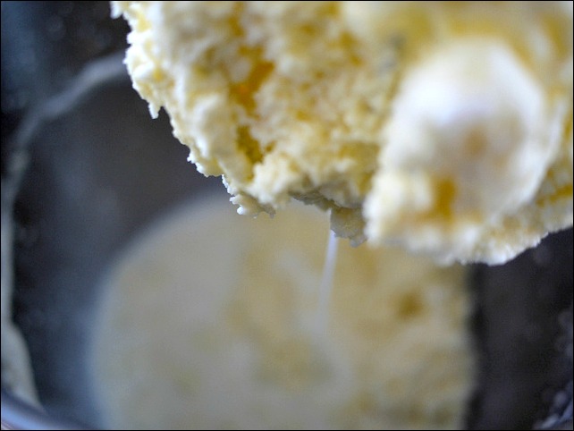 Buttermilk separates from the butter.